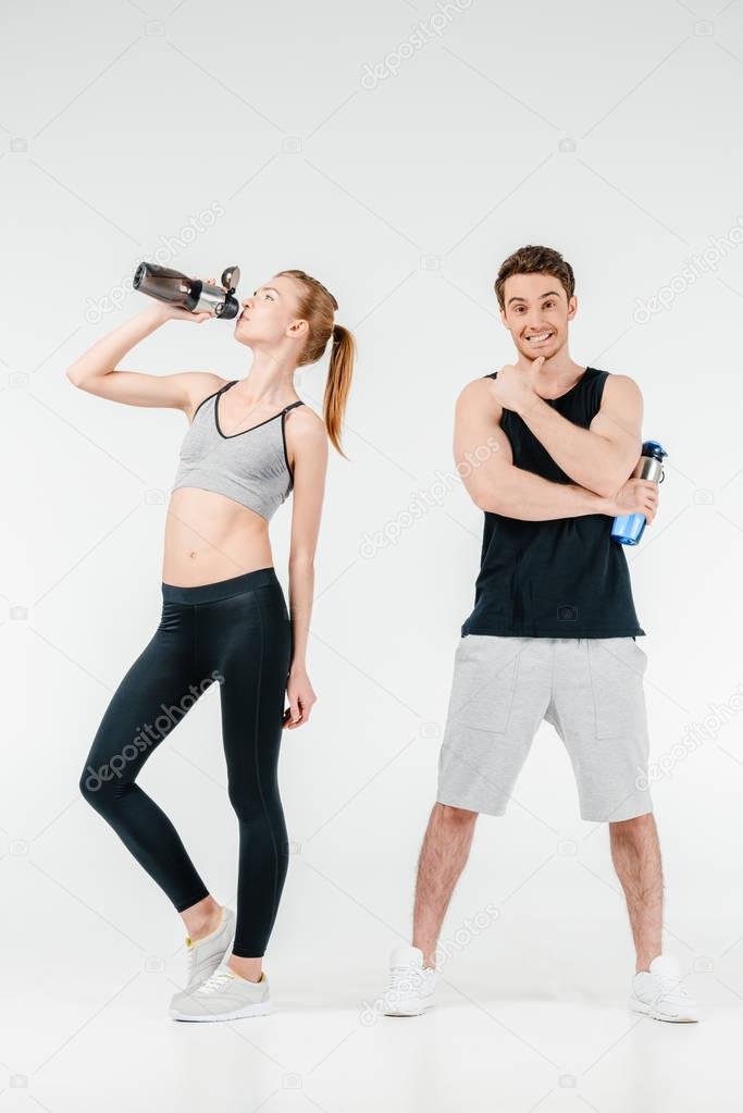 couple with fitness shakers