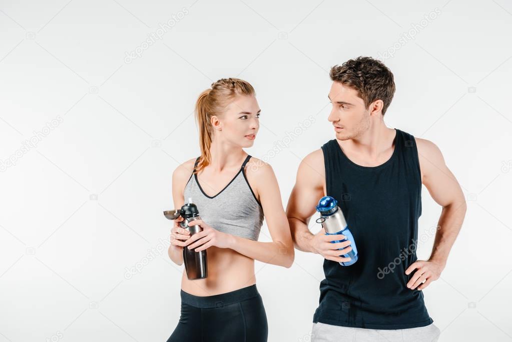 couple with fitness shakers