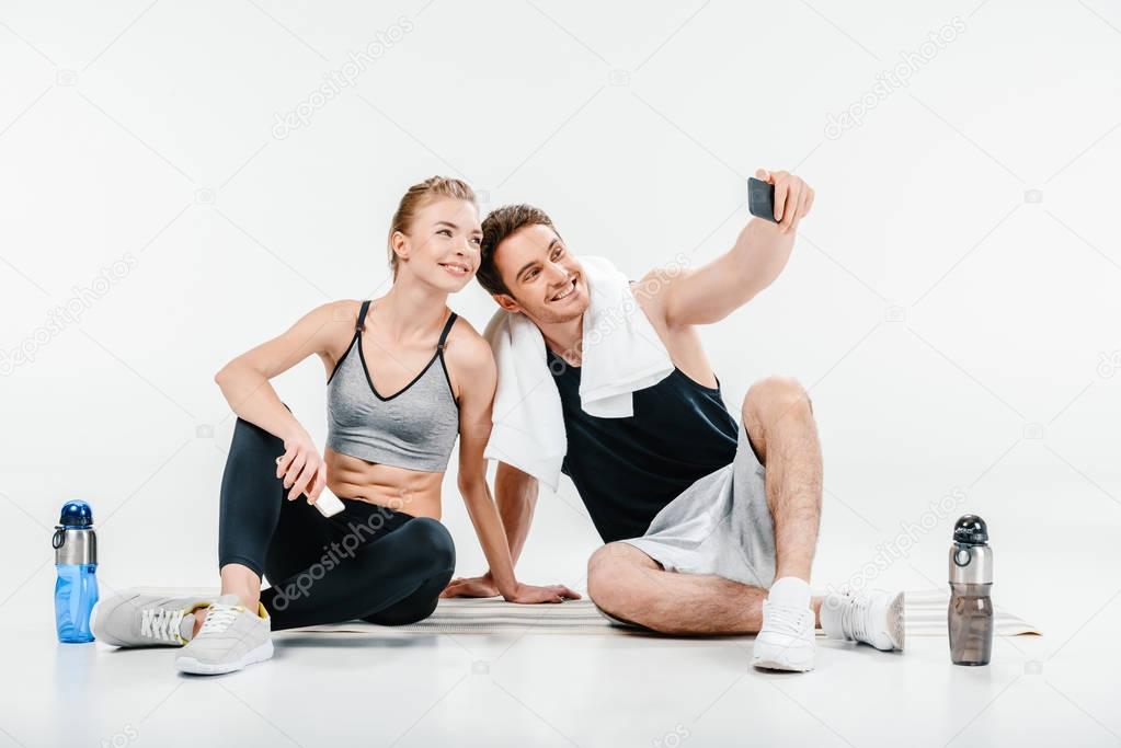 couple taking selfie after training
