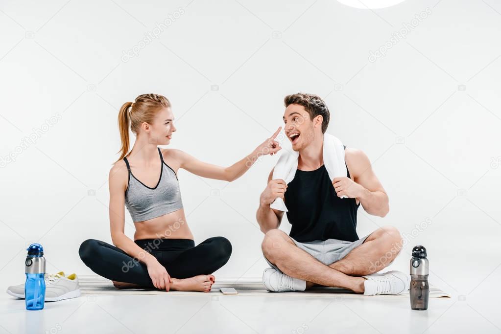 couple relaxign after workingout