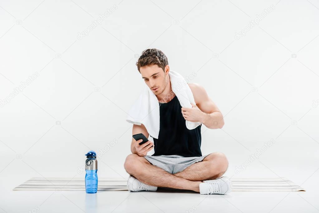 man checking activity in smartphone