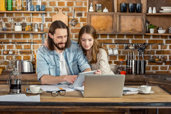 Couple working at home — Stock Photo