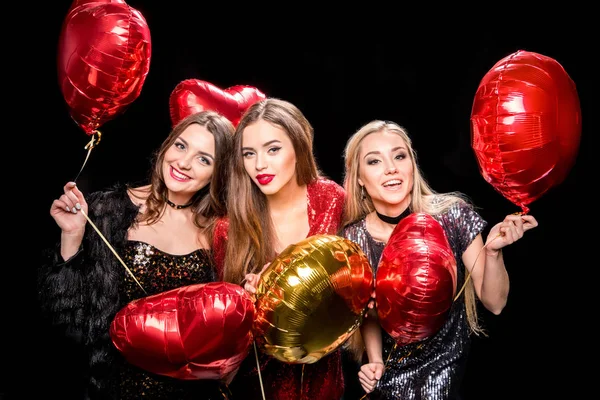 Preciosas mujeres con globos - foto de stock