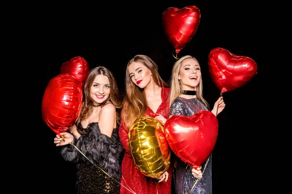 Preciosas mujeres con globos - foto de stock