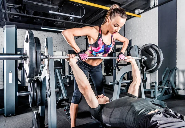 Sportspeople training in gym — Stock Photo