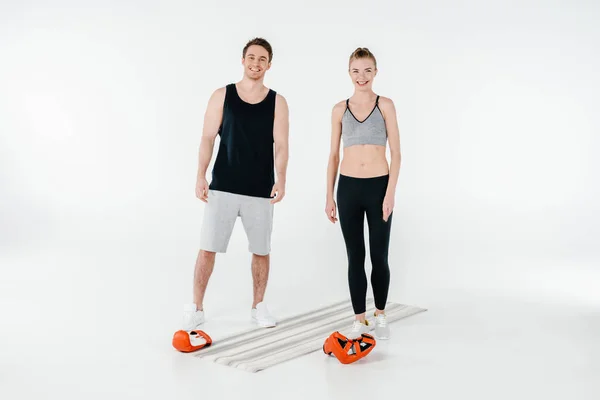 Young fit couple with boxing gloves — Stock Photo