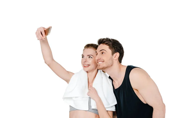 Heureux en forme couple prendre selfie — Photo de stock