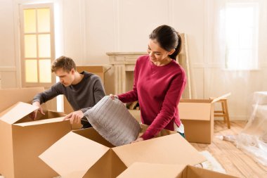couple moving into new house  clipart