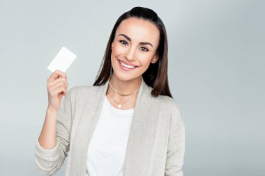 woman holding credit card clipart