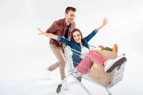 Couple with shopping cart — Stock Photo, Image