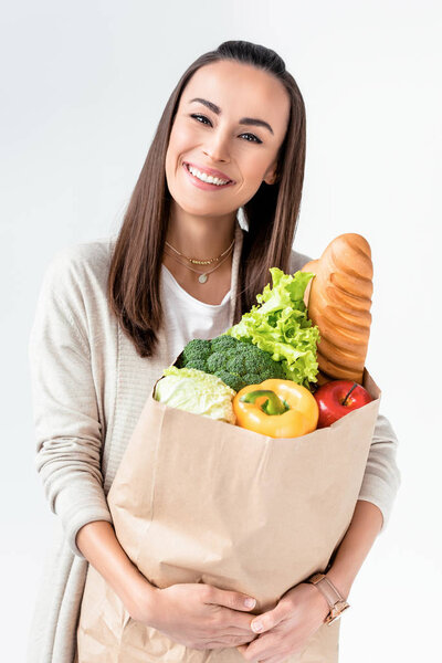 woman holding grocery bag