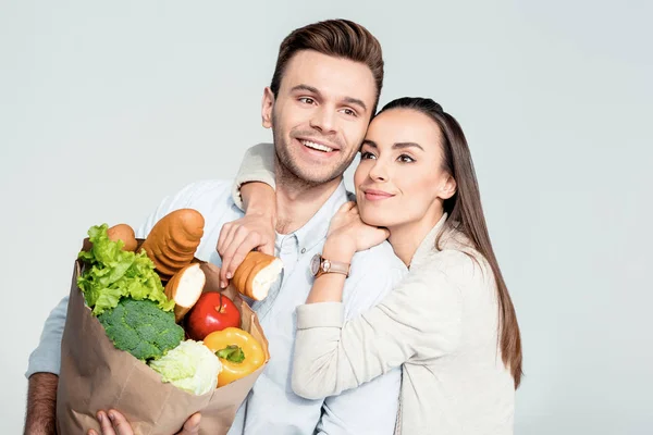 Pareja con bolsa de supermercado — Foto de Stock