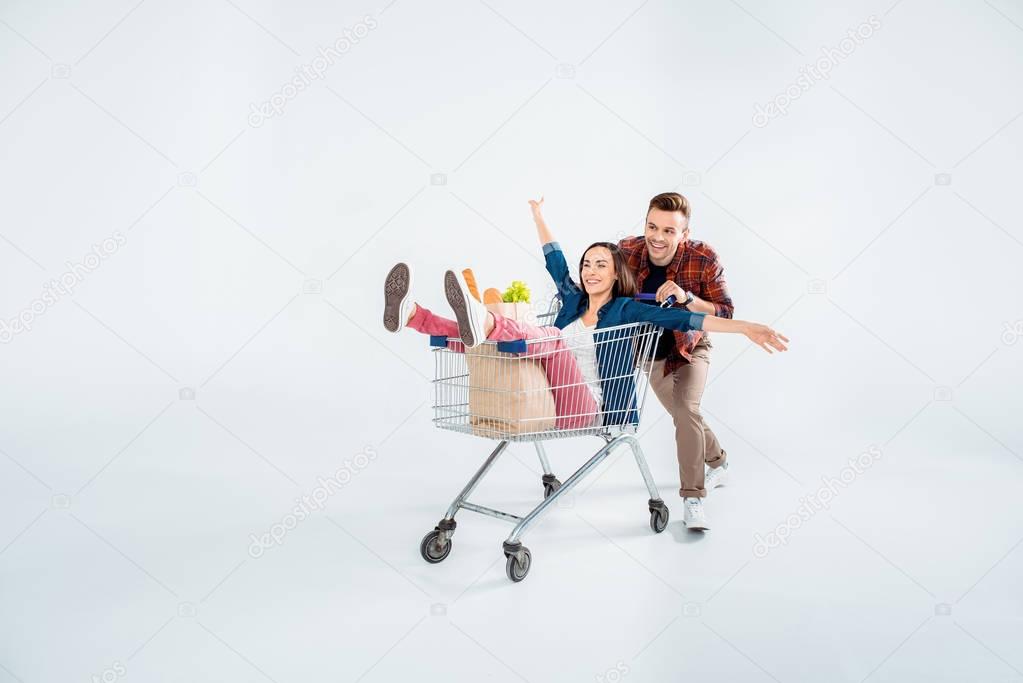 Couple with shopping cart