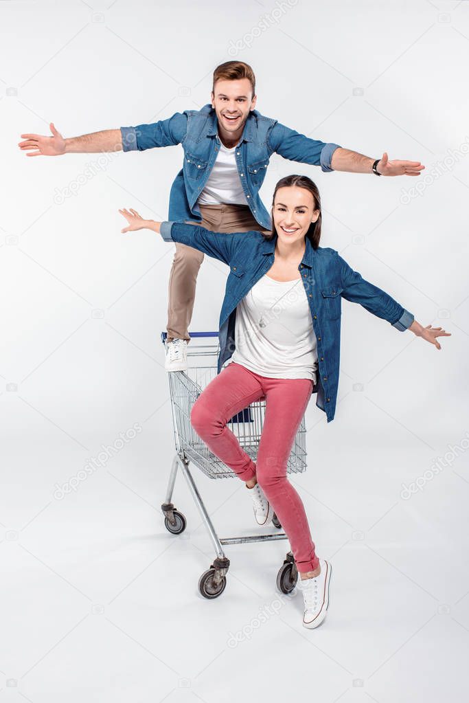 couple with shopping cart 