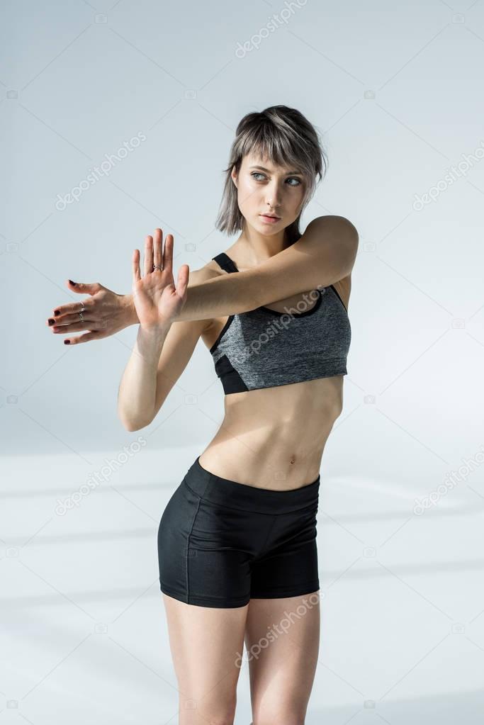 Young sportswoman training