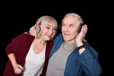 senior couple listening music clipart