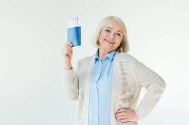 senior woman with passports and tickets clipart