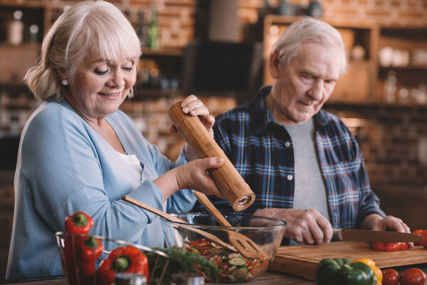 senior couple cooking together