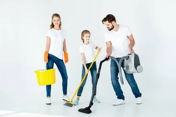 Family with cleaning supplies — Stock Photo, Image