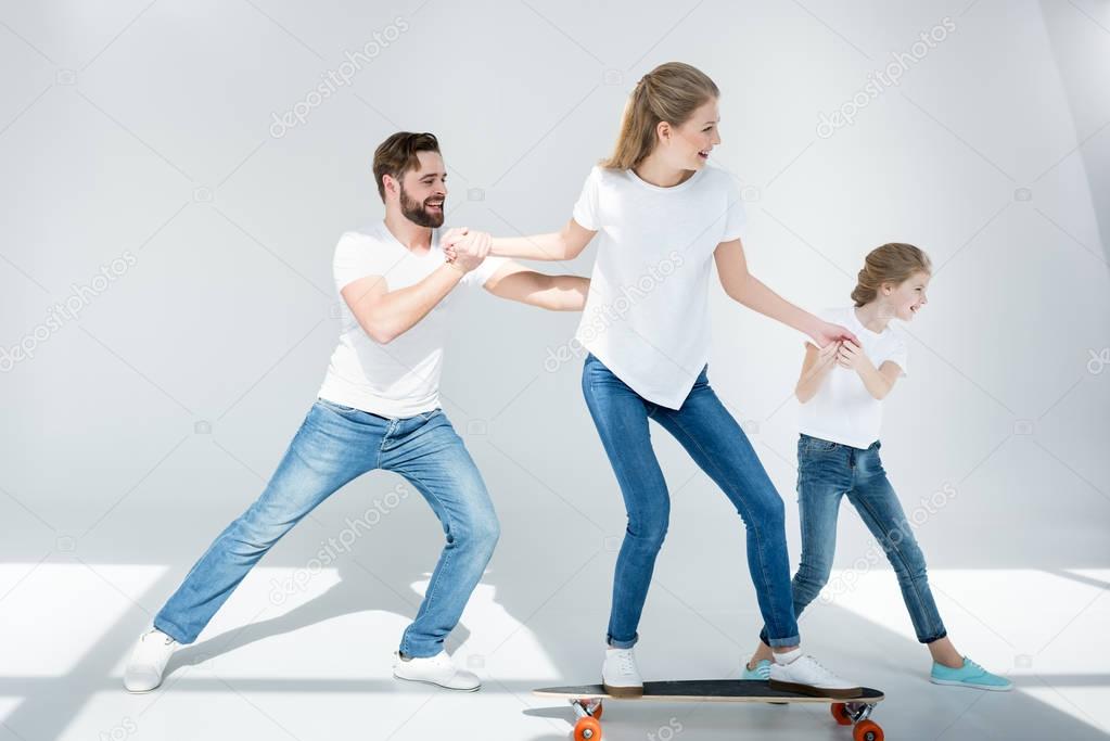 Young family with skateboard 