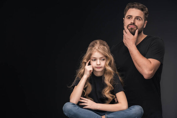 pensive father and daughter