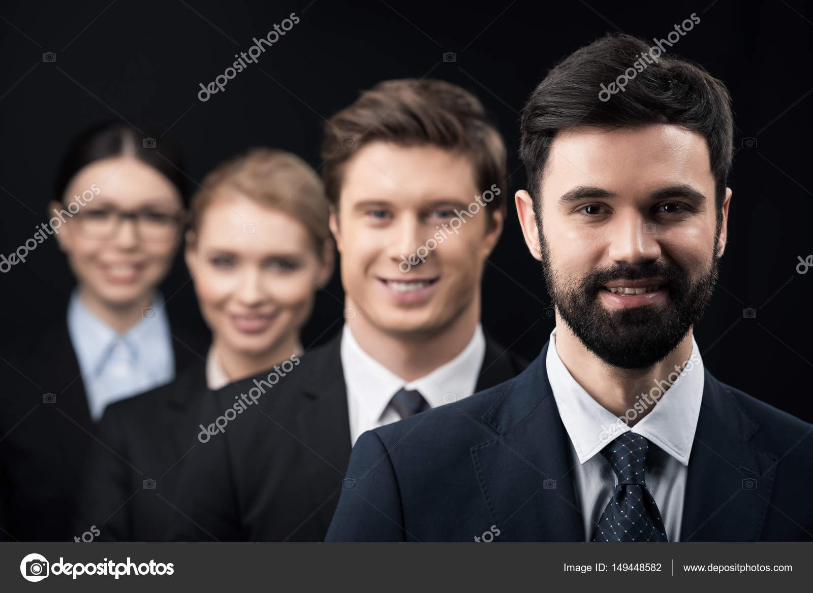 Business people standing in row — Stock Photo © TarasMalyarevich #149448582 Business people standing in row