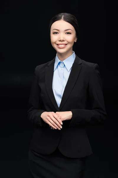 Forretningskvinde i sort jakkesæt - Stock-foto