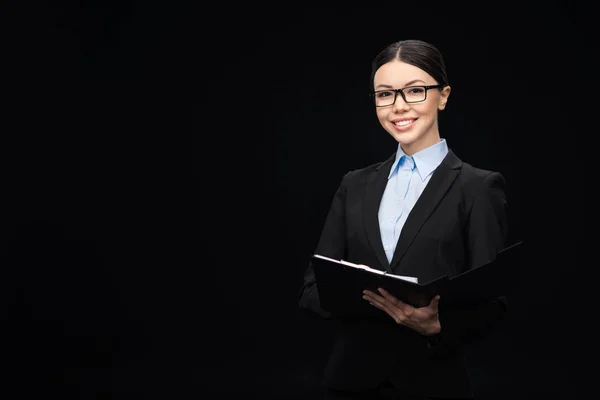 Brunette businesswoman with clipboard — Stock Photo, Image