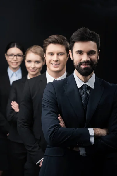 Business people standing in row — Stock Photo, Image