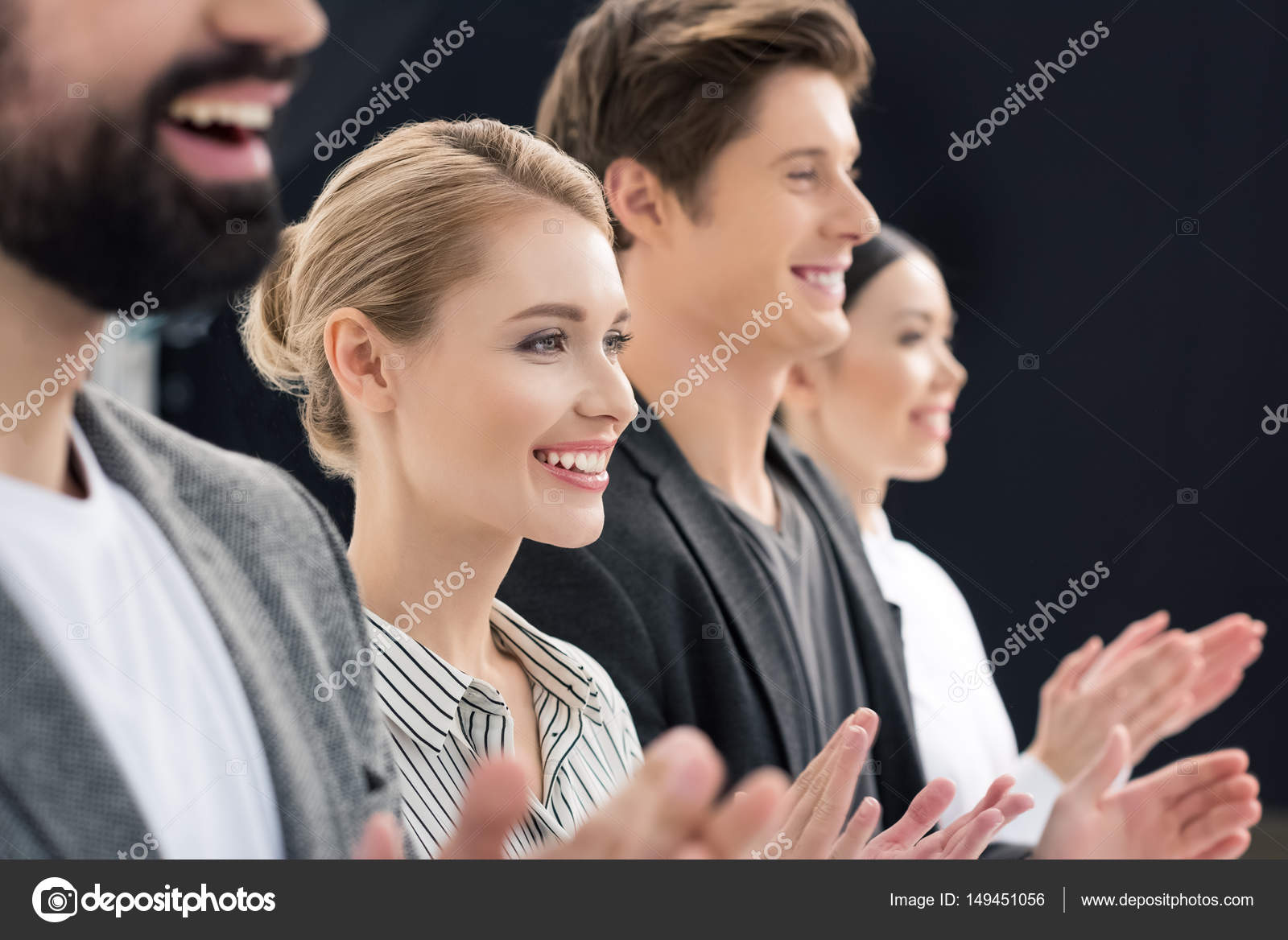 Business people standing in row — Stock Photo © TarasMalyarevich #149451056 Business people standing in row