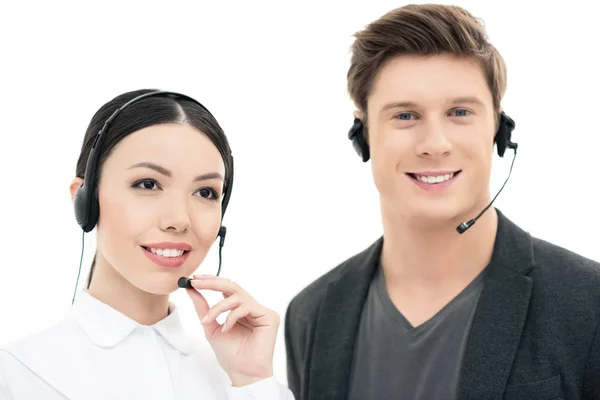 Callcenter operatörer i hörlurarna — Stockfoto