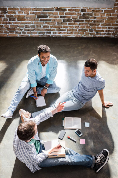 men working on project 