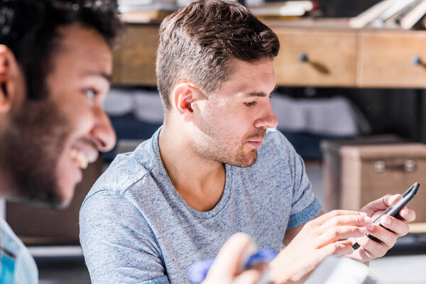 man using smartphone