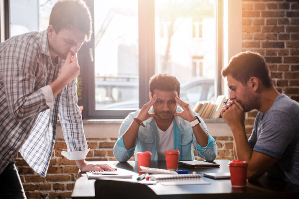 Men working on project 
