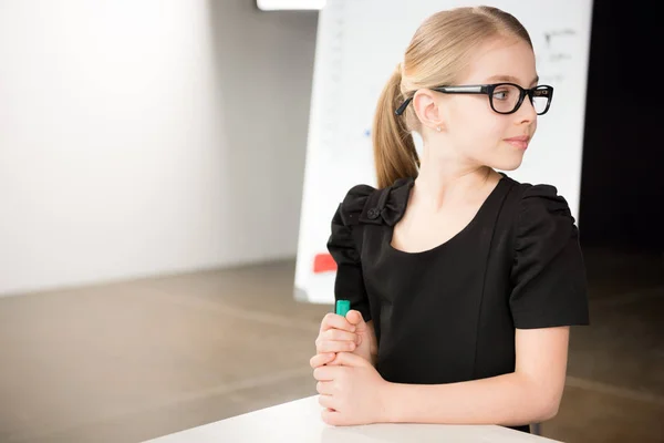 Cute little girl in glasses — Stock Photo, Image