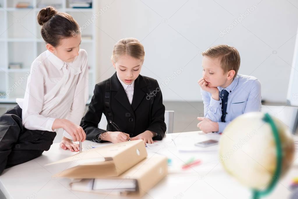 Children working in office  