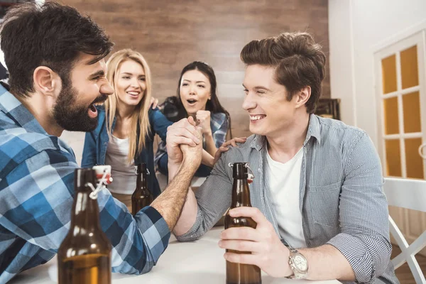 Men with hands clasped in arm wrestling challenge — Stock Photo, Image