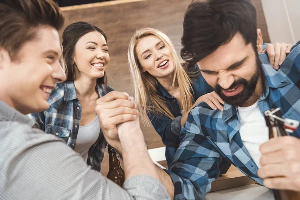 Men with hands clasped in arm wrestling challenge — Stock Photo, Image