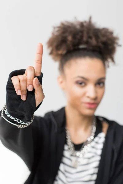 African american girl pointing up — Stock Photo, Image