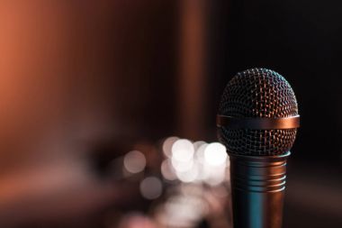 Electric microphone on stage clipart