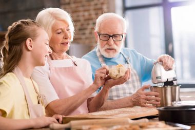 Family kneading dough  clipart