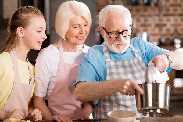 Family preparing dough 