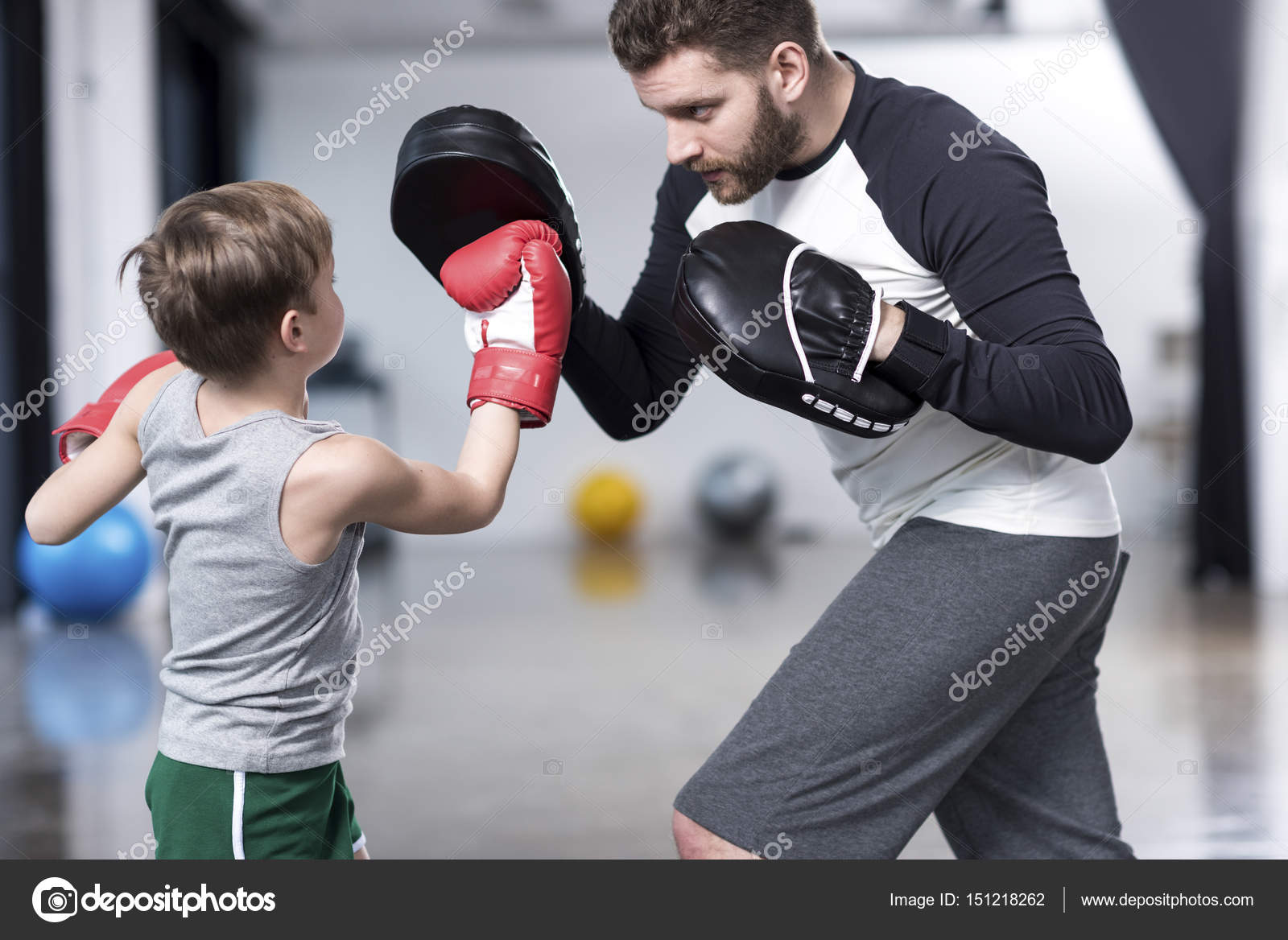 Boy boxer practicing punches — Stock Photo © TarasMalyarevich 151218262