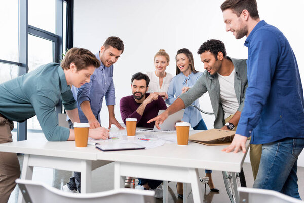 businesspeople discussing and brainstorming