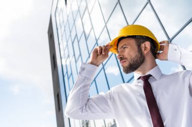 professional architect in hard hat clipart