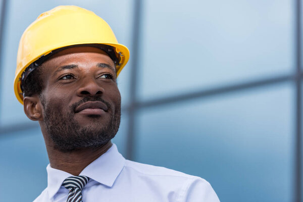 Professional architect in hard hat 