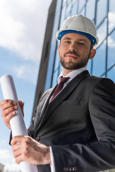 Professional architect in hard hat 