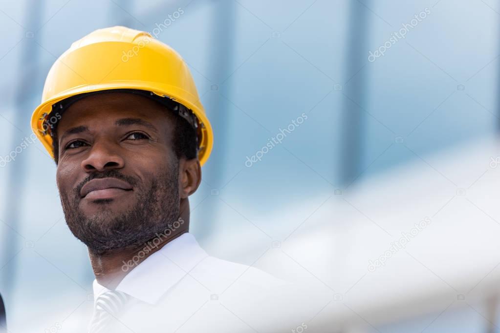 Professional architect in hard hat 