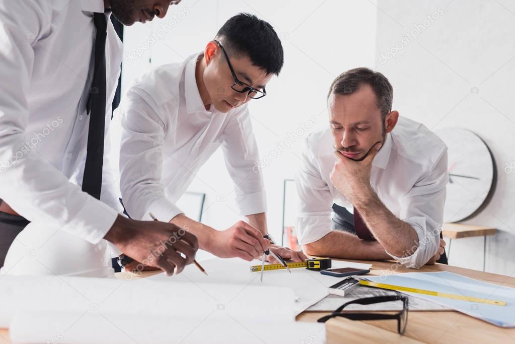 team of architects working in office