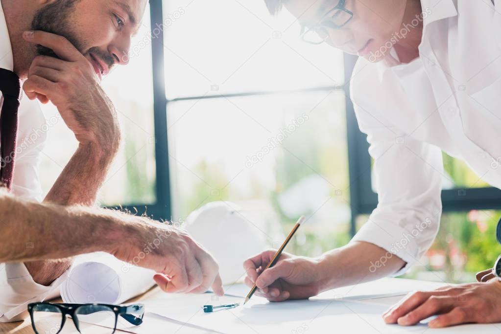 professional architects working at modern office